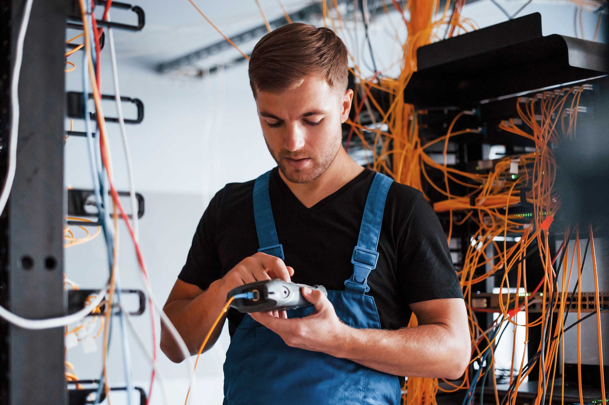 young-man-in-uniform-with-measuring-device-works-w-2023-11-27-05-29-18-utc